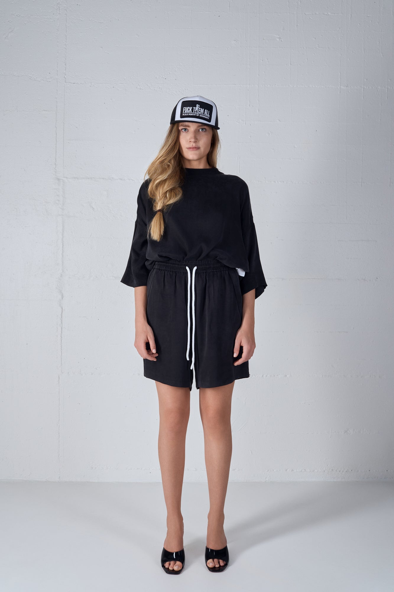 FUCK THEM ALL CAP WHITE