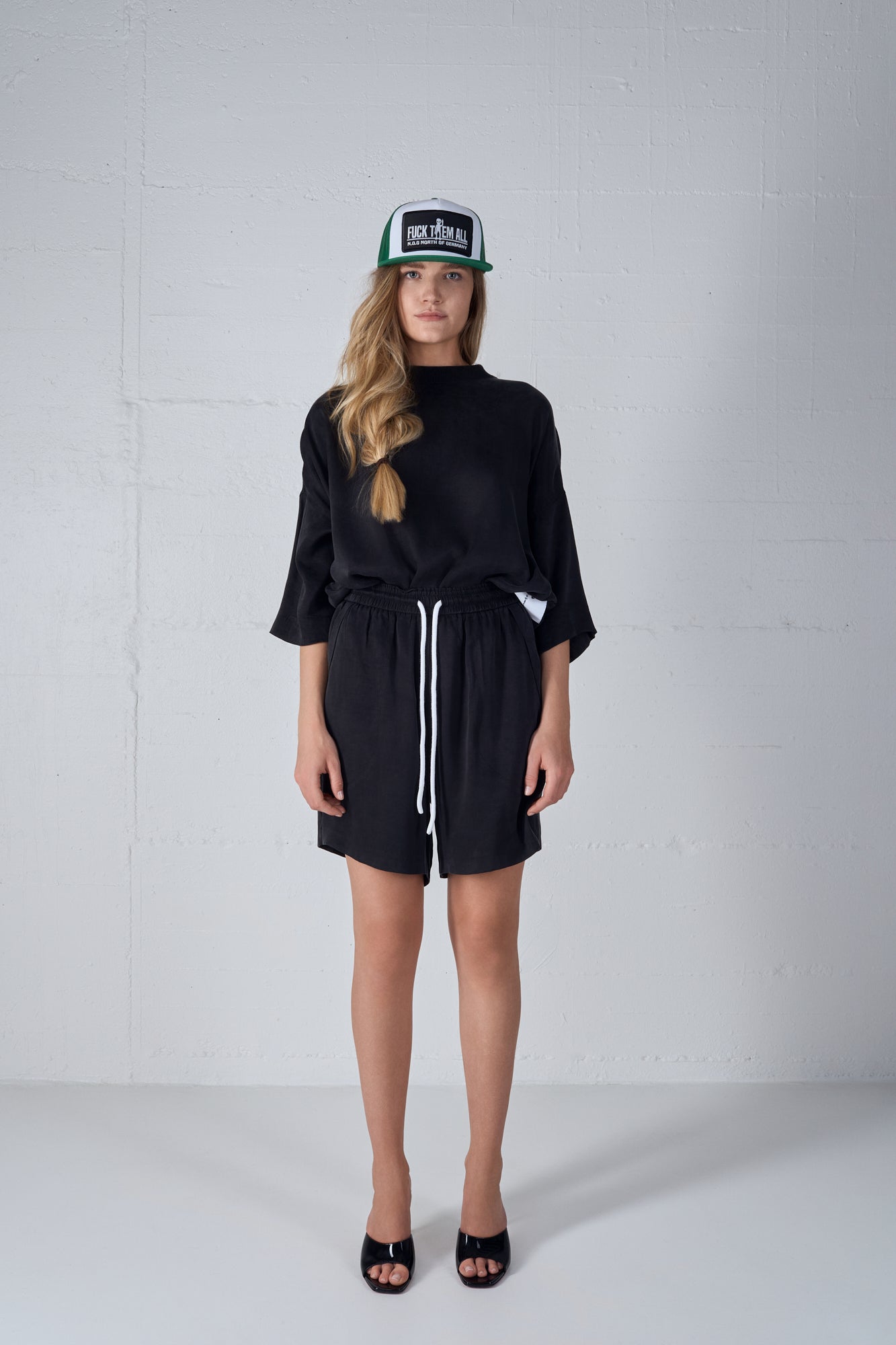 FUCK THEM ALL CAP GREEN